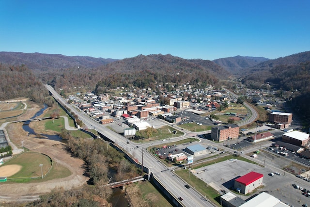 drone / aerial view featuring a mountain view
