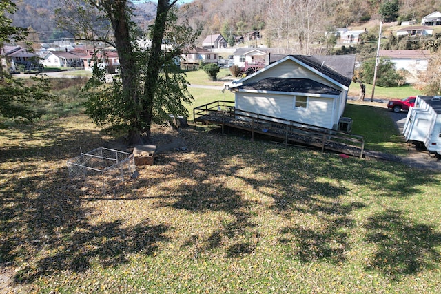 view of yard with a deck