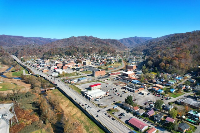 drone / aerial view featuring a mountain view