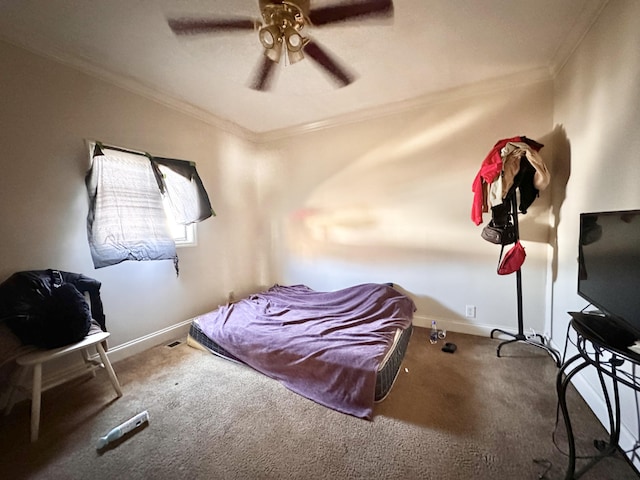 bedroom with ceiling fan, carpet, baseboards, and ornamental molding