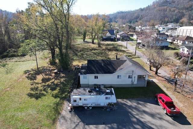 aerial view featuring a view of trees