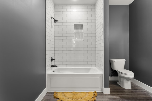 700 Nick Ln, Winchester, KY 40391 - bathroom featuring  shower combination, toilet, wood finished floors, and baseboards