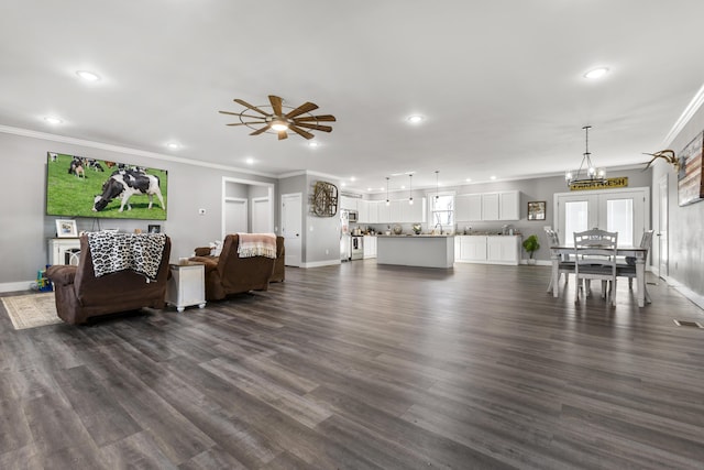 700 Nick Ln, Winchester, KY 40391 - living area with baseboards, dark wood finished floors, ornamental molding, recessed lighting, and ceiling fan with notable chandelier