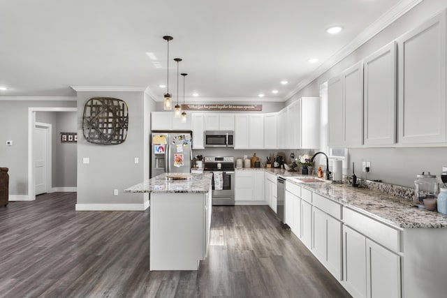 700 Nick Ln, Winchester, KY 40391 - kitchen featuring a sink, a center island, stainless steel appliances, white cabinets, and crown molding