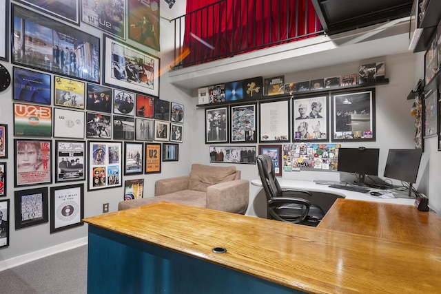 office space featuring baseboards and carpet flooring