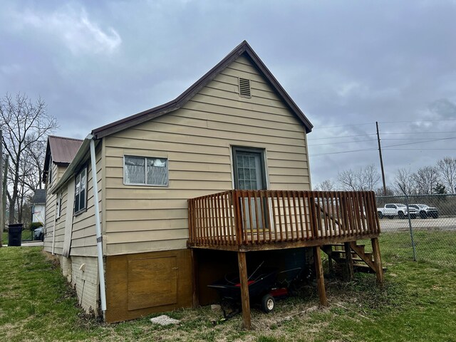 400 Washington St, Paris, KY 40361 - rear view of house with a deck, fence, and metal roof