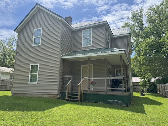 104 First St, Cynthiana, KY 41031 - view of front of house with metal roof, a chimney, and a porch