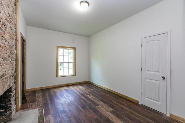 104 First St, Cynthiana, KY 41031 - unfurnished living room with dark wood-style floors and baseboards