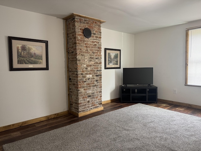 104 First St, Cynthiana, KY 41031 - unfurnished living room with wood finished floors and baseboards