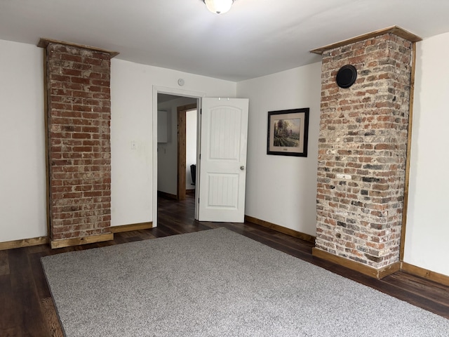 104 First St, Cynthiana, KY 41031 - unfurnished room featuring dark wood-style floors and baseboards