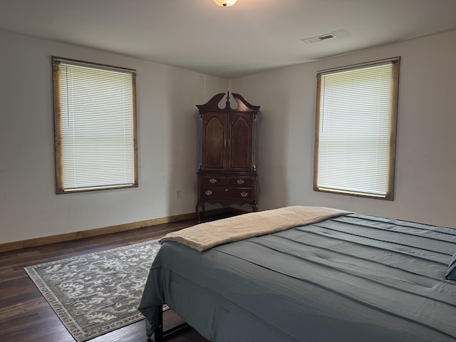 104 First St, Cynthiana, KY 41031 - bedroom featuring dark wood finished floors and baseboards