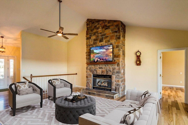 1794 Hunter Dr, Lancaster, KY 40444 - living room featuring wood finished floors, ceiling fan, a fireplace, and high vaulted ceiling