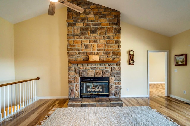 1794 Hunter Dr, Lancaster, KY 40444 - unfurnished living room with lofted ceiling, wood finished floors, a fireplace, ceiling fan, and baseboards
