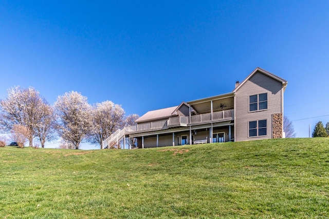 1794 Hunter Dr, Lancaster, KY 40444 - rear view of house featuring ceiling fan, a yard, a deck, and a chimney