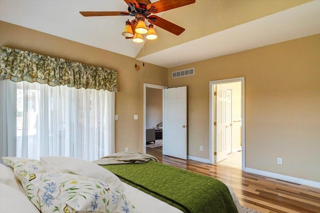 1794 Hunter Dr, Lancaster, KY 40444 - bedroom featuring wood finished floors, baseboards, ensuite bathroom, and a ceiling fan