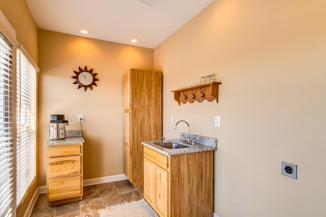1794 Hunter Dr, Lancaster, KY 40444 - indoor wet bar with baseboards, recessed lighting, and stone finish floors