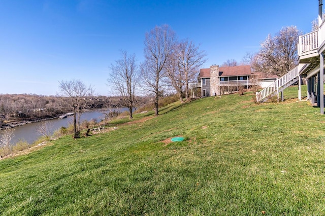 1794 Hunter Dr, Lancaster, KY 40444 - view of green lawn with a water view and stairway