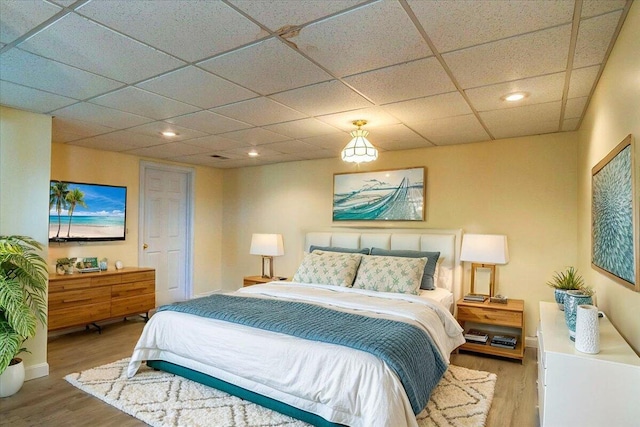 1794 Hunter Dr, Lancaster, KY 40444 - bedroom featuring wood finished floors, a drop ceiling, and recessed lighting