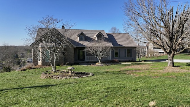 1794 Hunter Dr, Lancaster, KY 40444 - view of front of house with a chimney, a front lawn, and metal roof