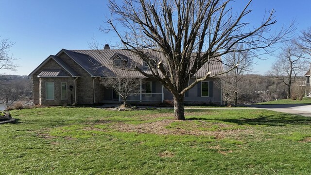 1794 Hunter Dr, Lancaster, KY 40444 - view of front of property with a front lawn, a chimney, and metal roof