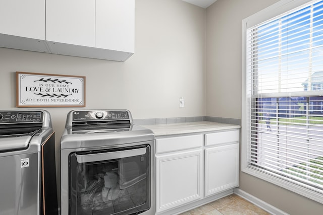 205 Hedgewood Ln, Richmond, KY 40475 - clothes washing area featuring independent washer and dryer, cabinet space, and light tile patterned floors