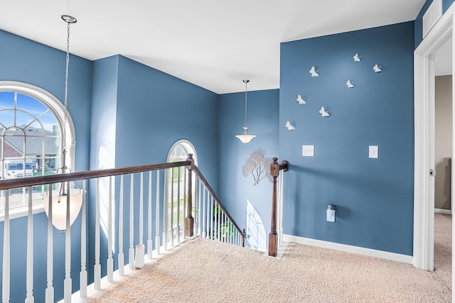 205 Hedgewood Ln, Richmond, KY 40475 - hallway with baseboards, an upstairs landing, and carpet flooring