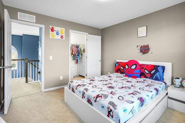 205 Hedgewood Ln, Richmond, KY 40475 - bedroom with a closet, visible vents, baseboards, light carpet, and a spacious closet