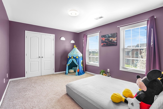 205 Hedgewood Ln, Richmond, KY 40475 - bedroom with baseboards, visible vents, a closet, and carpet