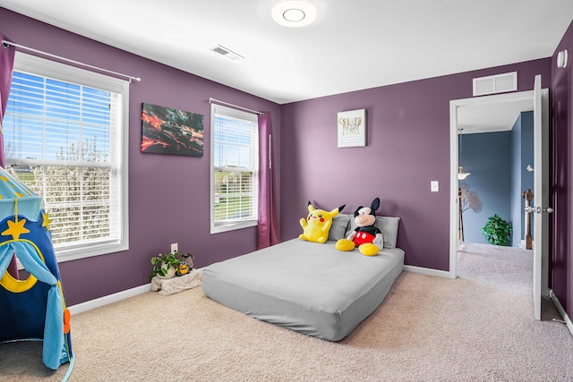 205 Hedgewood Ln, Richmond, KY 40475 - bedroom with multiple windows, visible vents, and carpet