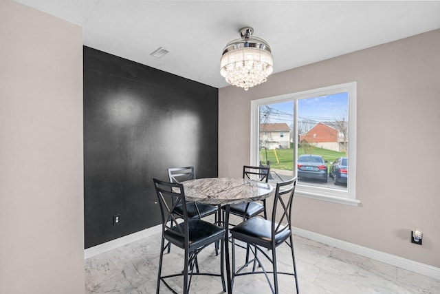 101 Bell Lawn Dr, Nicholasville, KY 40356 - dining room featuring baseboards, marble finish floor, visible vents, and a chandelier