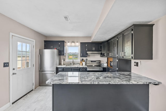 101 Bell Lawn Dr, Nicholasville, KY 40356 - kitchen with stainless steel appliances, marble finish floor, a sink, light stone counters, and a peninsula