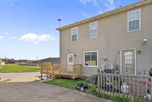 101 Bell Lawn Dr, Nicholasville, KY 40356 - back of house with concrete driveway, central AC, and a deck