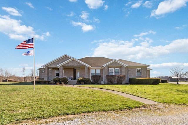 398 Jim Weaver Rd, Crab Orchard, KY 40419 - single story home with a front lawn, covered porch, and brick siding