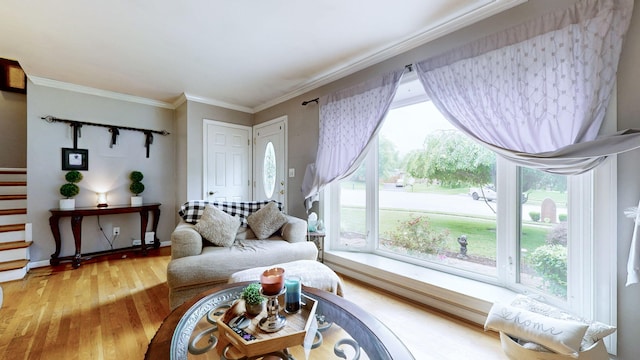 3485 Twillingate Ct, Lexington, KY 40503 - living area with light wood-type flooring, plenty of natural light, ornamental molding, and stairs