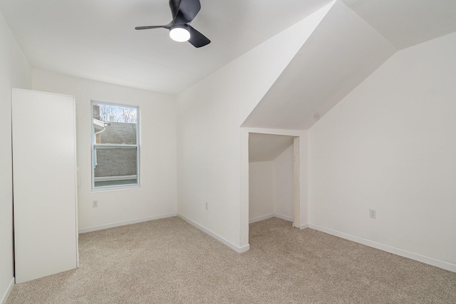 104 W 1st St, Silver Grove, KY 41085 - additional living space featuring a ceiling fan, light carpet, baseboards, and vaulted ceiling