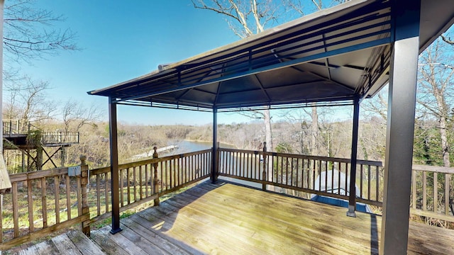 wooden deck featuring a gazebo