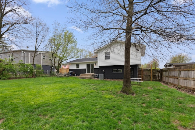 view of yard with a fenced backyard