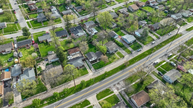 birds eye view of property with a residential view