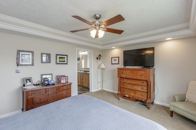 bedroom with carpet flooring, ornamental molding, baseboards, and a textured ceiling
