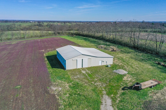 birds eye view of property with a rural view