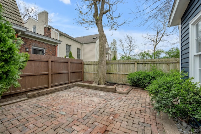 view of patio with a fenced backyard