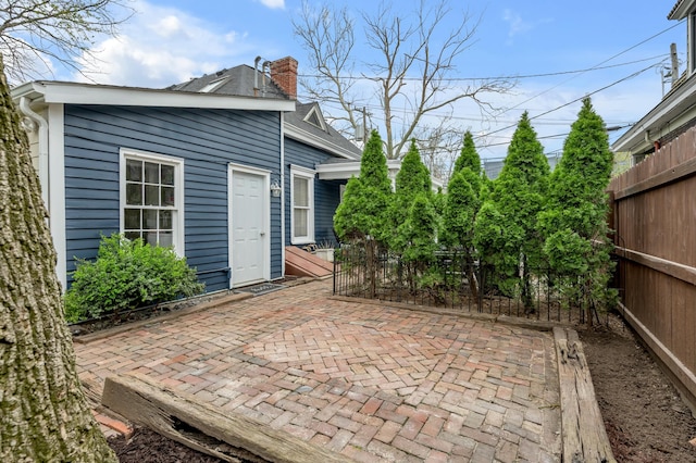 view of patio with fence