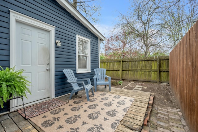 wooden deck featuring fence