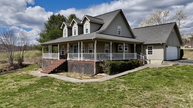 35 Fox Trail Rd, Manchester, KY 40962 - farmhouse with a garage, roof with shingles, a porch, and a front yard