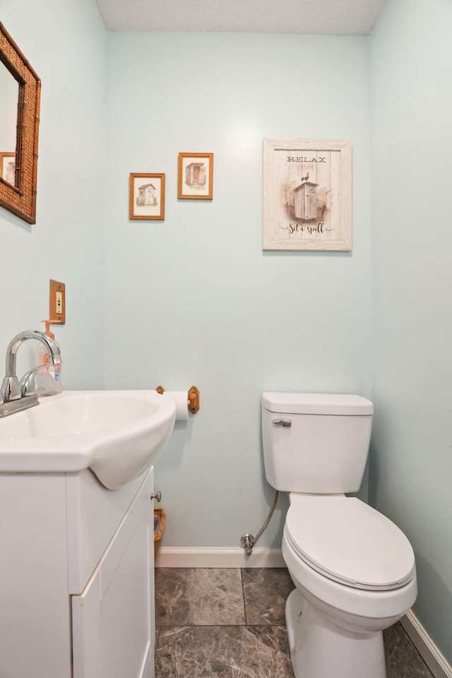 35 Fox Trail Rd, Manchester, KY 40962 - half bath featuring toilet, vanity, and baseboards
