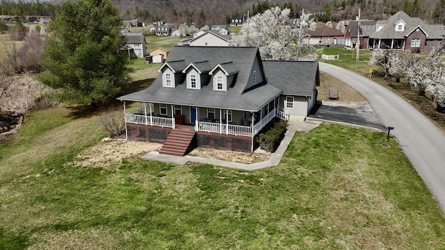 35 Fox Trail Rd, Manchester, KY 40962 - exterior space featuring a shingled roof, a front yard, covered porch, and stairway