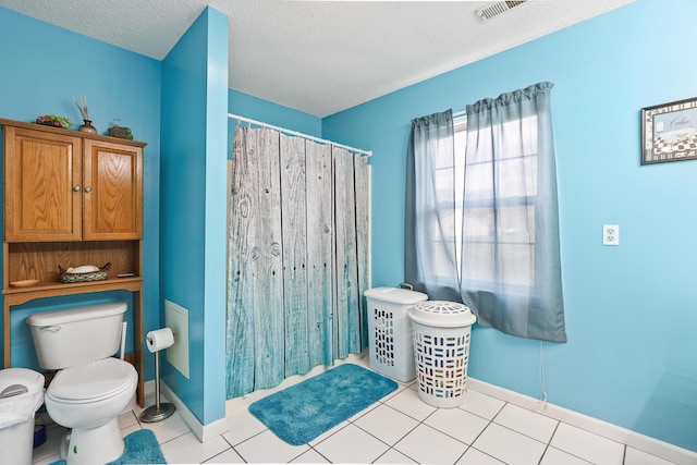 35 Fox Trail Rd, Manchester, KY 40962 - bathroom with a textured ceiling, visible vents, toilet, tile patterned floors, and curtained shower