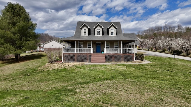 35 Fox Trail Rd, Manchester, KY 40962 - country-style home featuring covered porch, a shingled roof, and a front yard