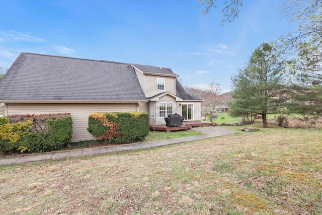 35 Fox Trail Rd, Manchester, KY 40962 - rear view of house with roof with shingles, a deck, and a lawn