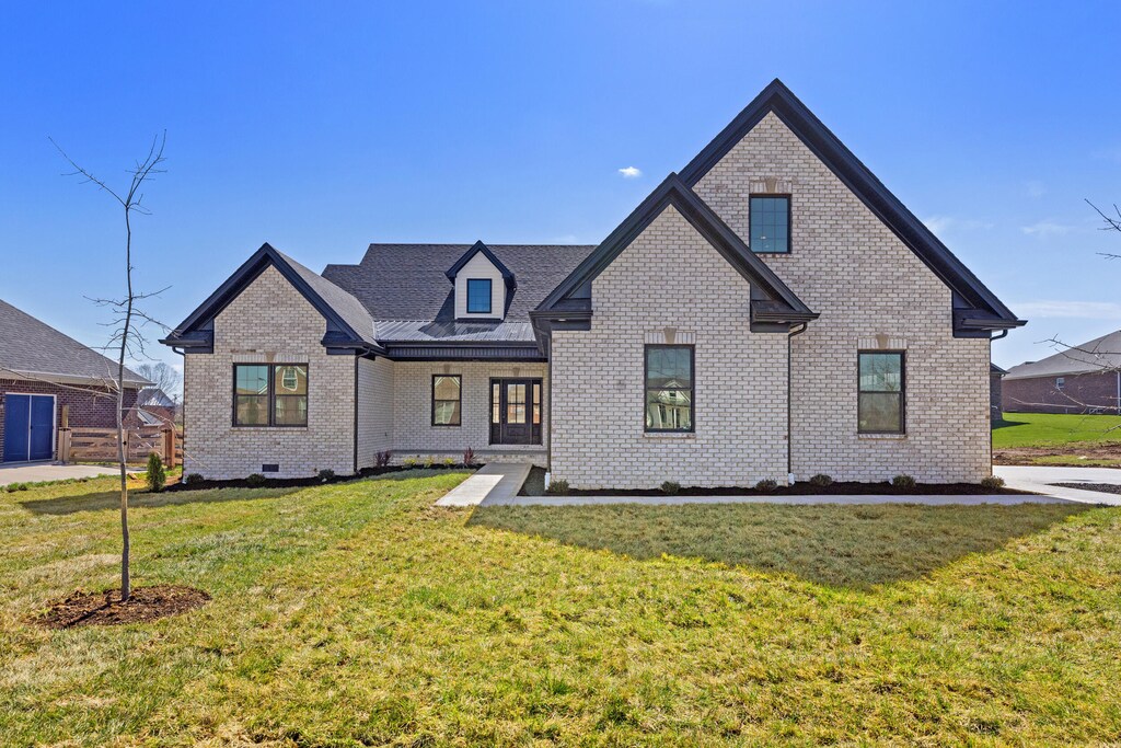 205 Witts Ln, Wilmore, KY 40390 - view of front facade featuring brick siding and a front yard